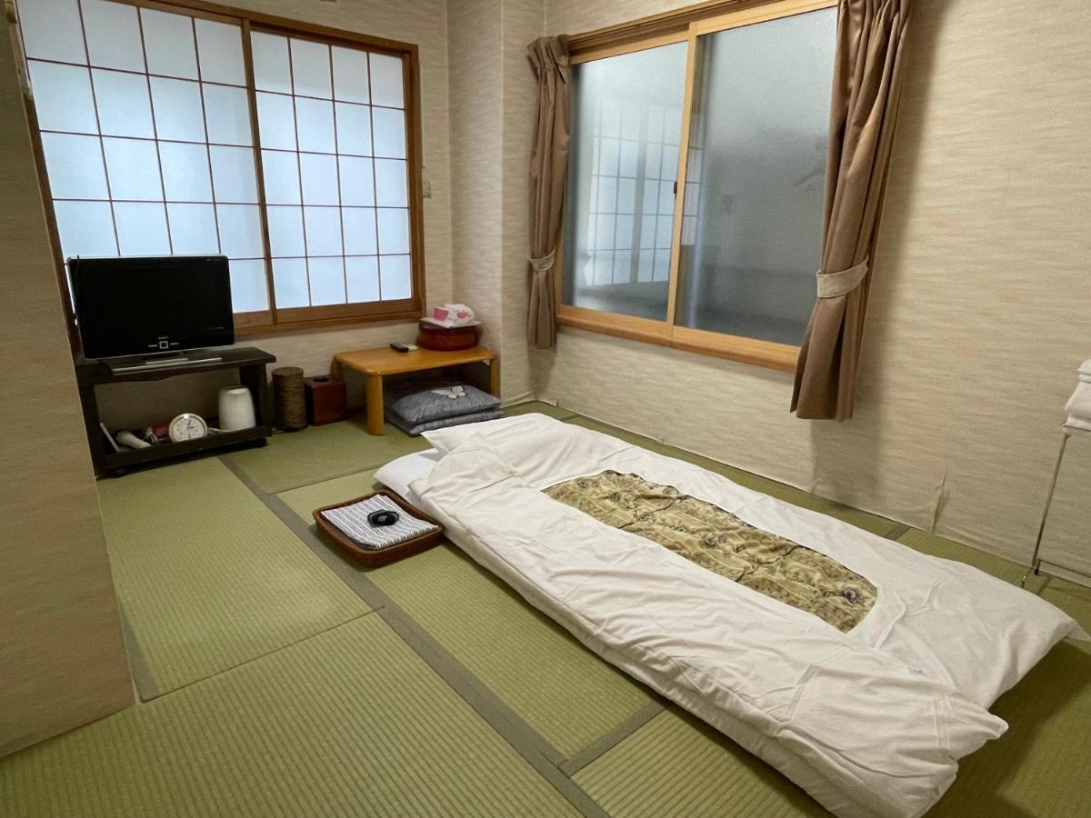 Ryokan Mikawaya Токио Экстерьер фото